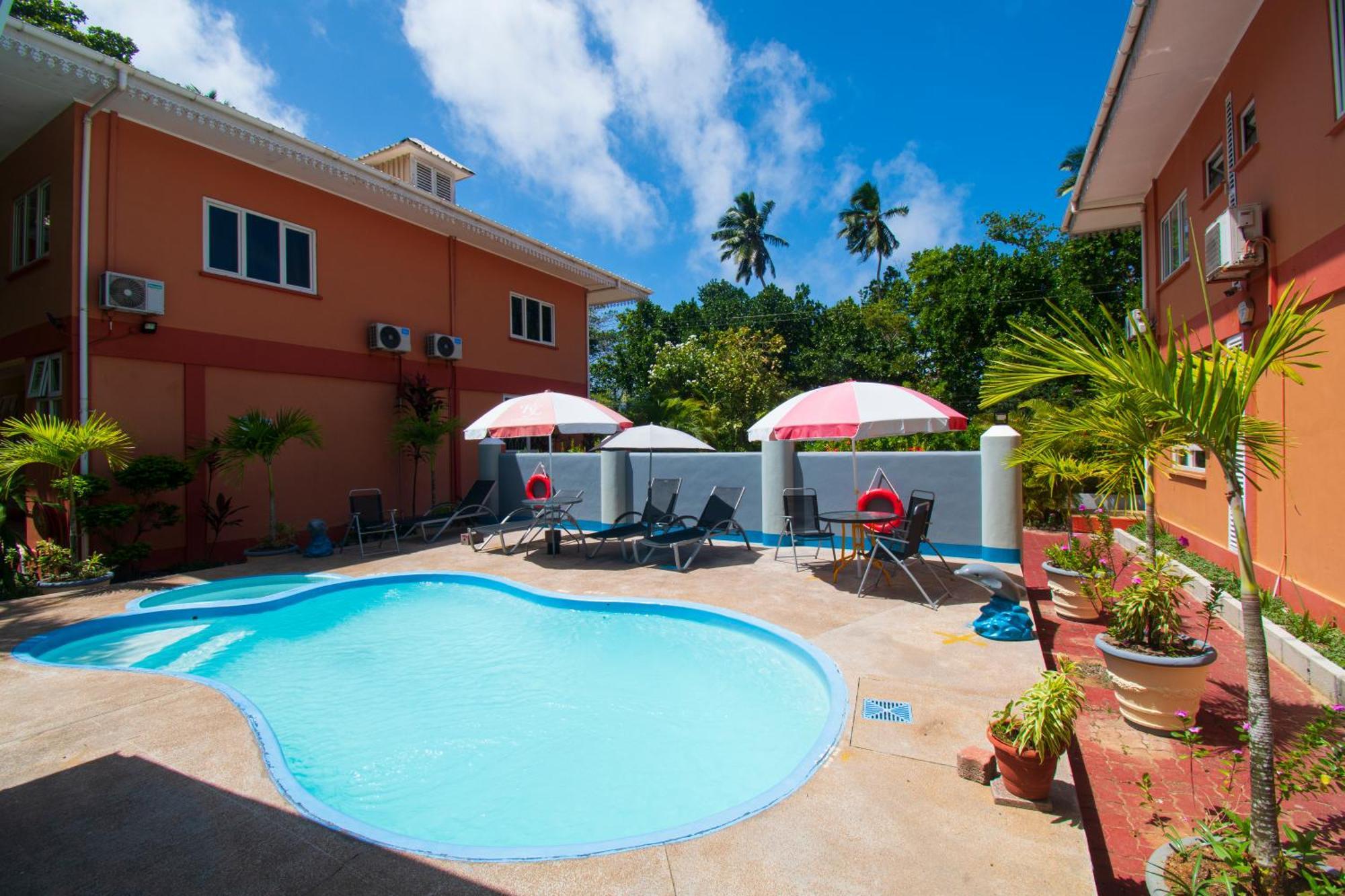 Reef Holiday Apartments Anse aux Pins Esterno foto